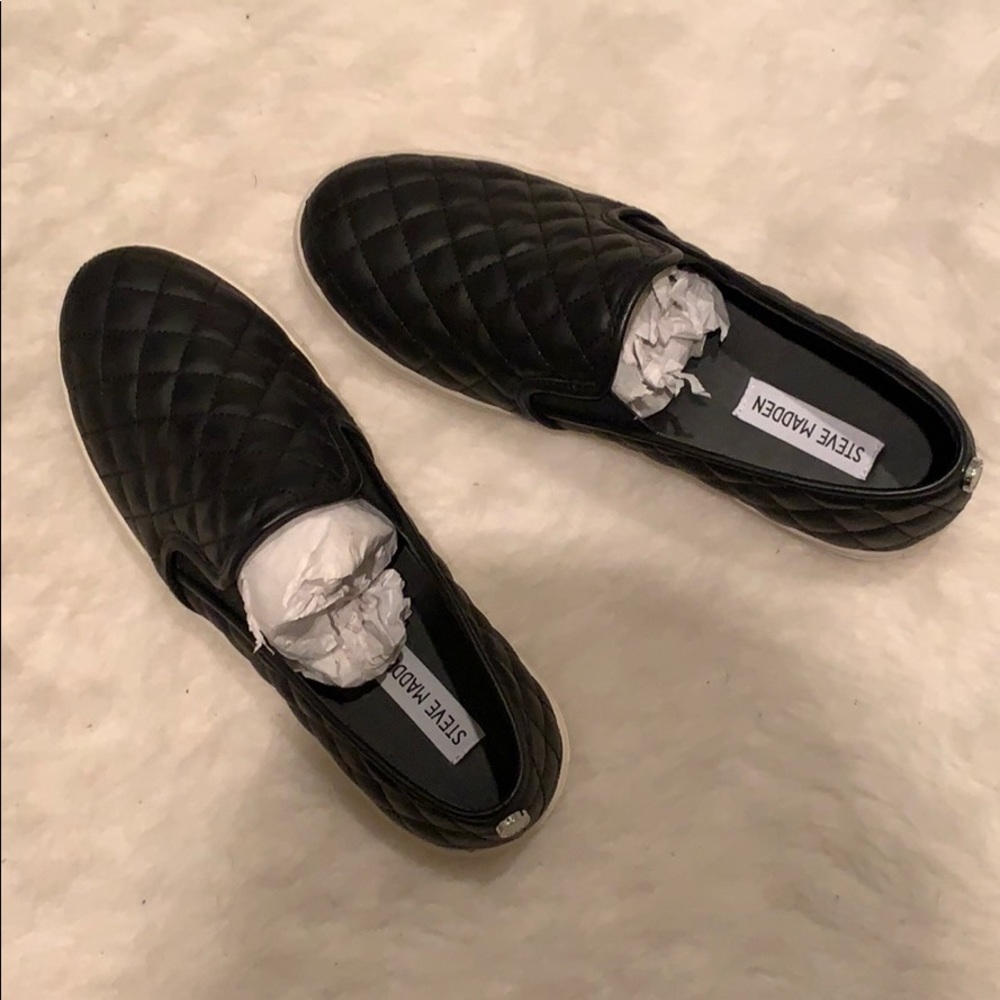 Black Steve Madden slip ons